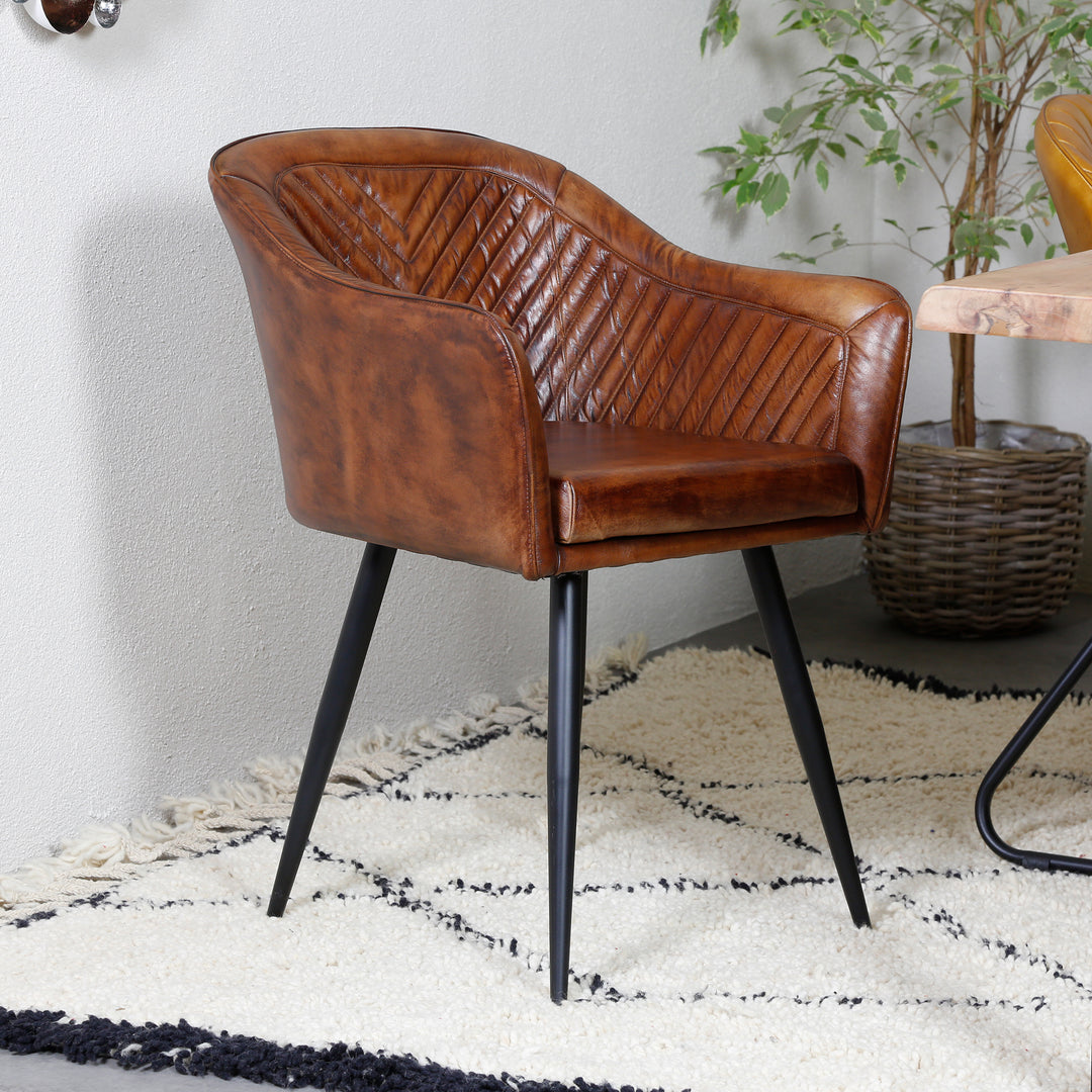Brown leather armchair