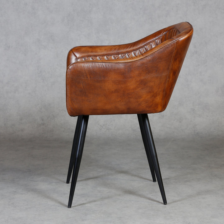 Brown leather armchair