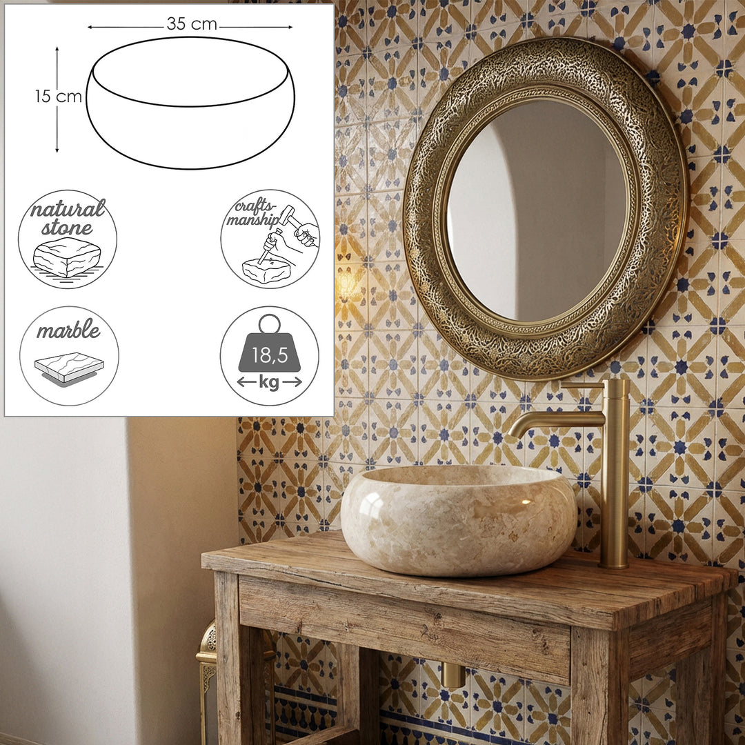 Round countertop washbasin made of beige natural stone on a wooden washbasin with brass fittings, supplemented by dimensional graphics with diameter, height and weight