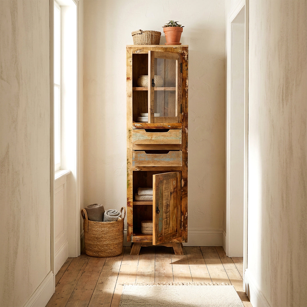 Display cabinet made of solid wood and old wood with drawer and doors in country house style, placed in the hallway