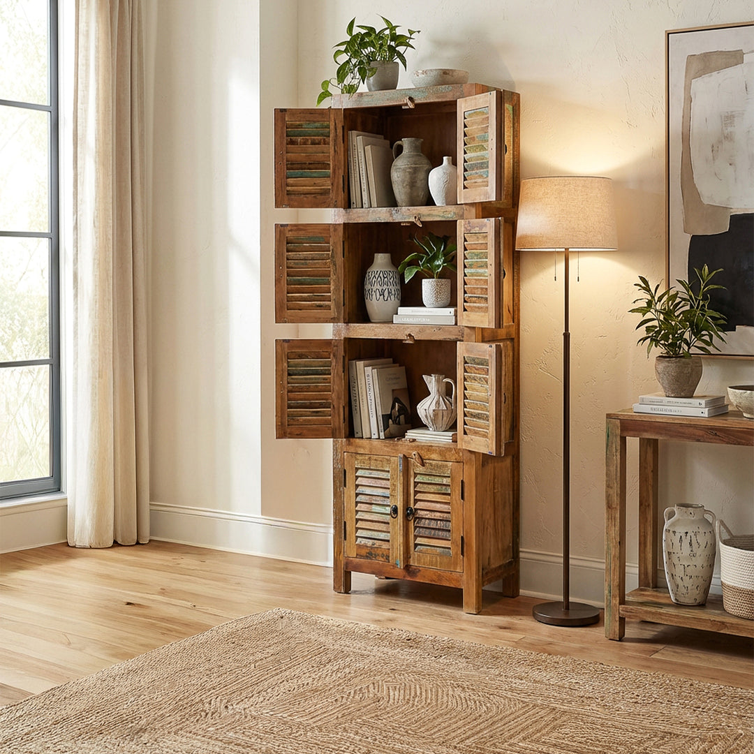 Cabinet made of old wood in country house style, narrow and free-standing in the living room