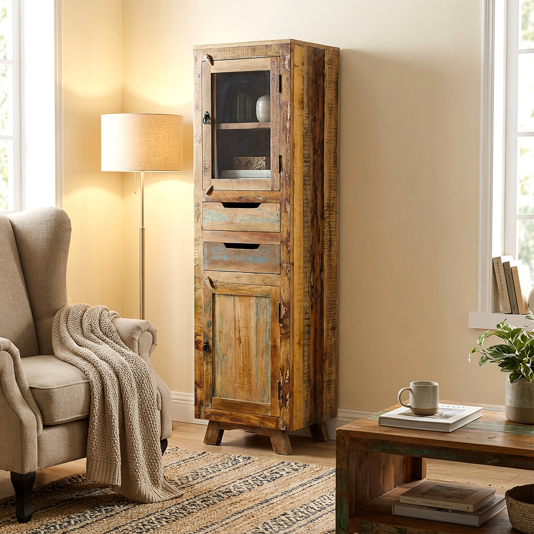 Display cabinet made of solid wood and old wood with drawer and doors in vintage style, placed in the living room